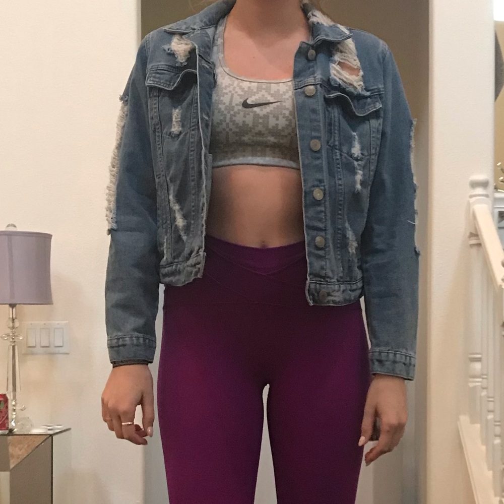 Distressed denim jacket